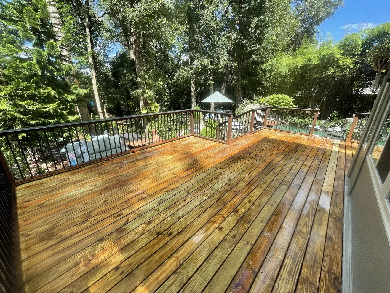 Deck with railing staining